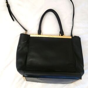 MICHAEL by Michael Kors black leather bag.